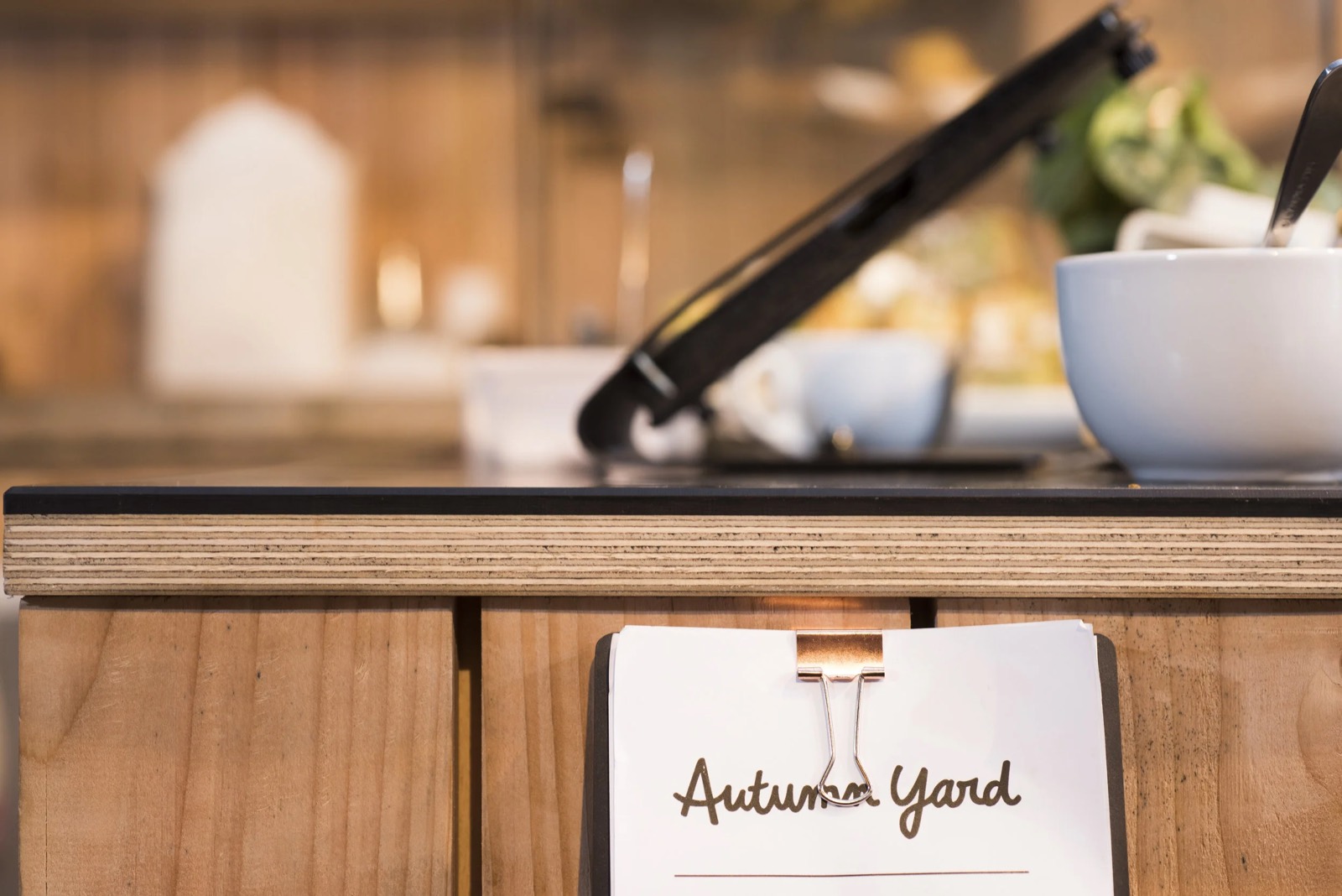 A table setting with the Autumn Yard menu