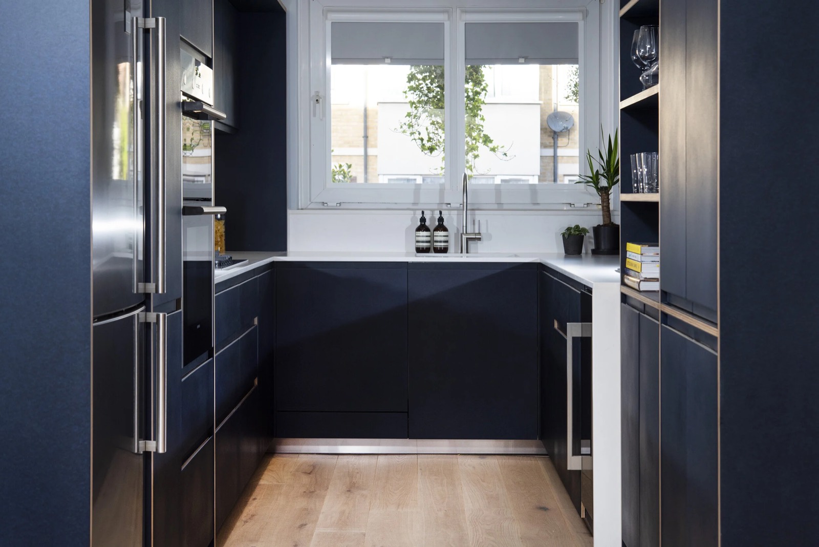 The dark Richlite worktop and appliances
