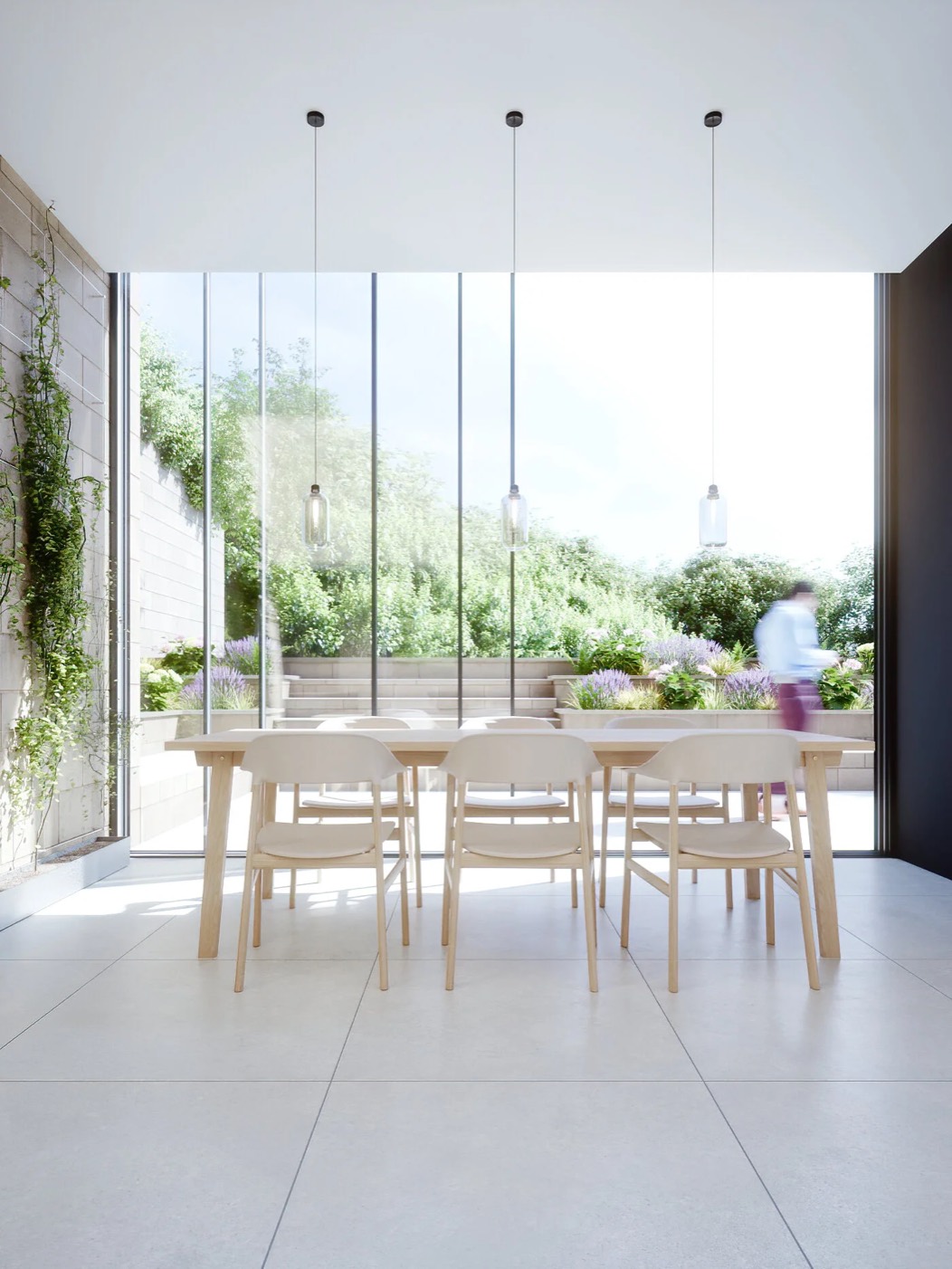 The dining space opening to the garden, rendered view