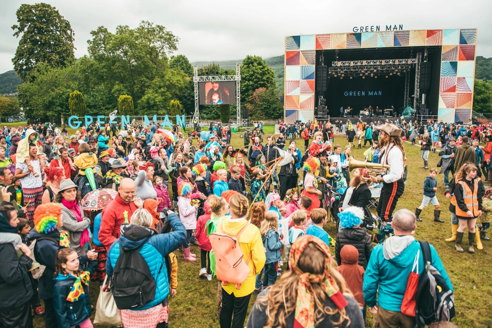 The stage and crowd in the daytime