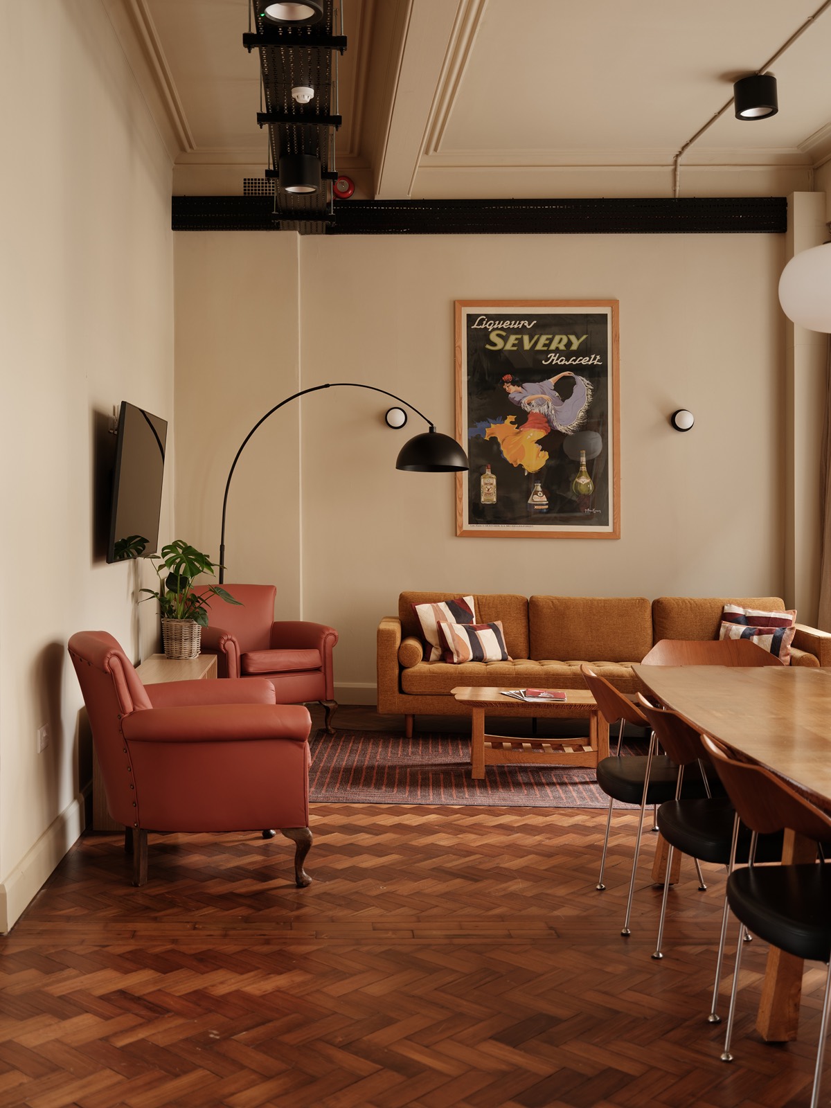 The staff common room with leather seating and parquet