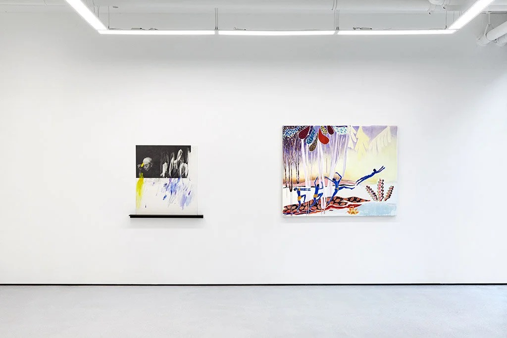 Work hung on the white gallery wall