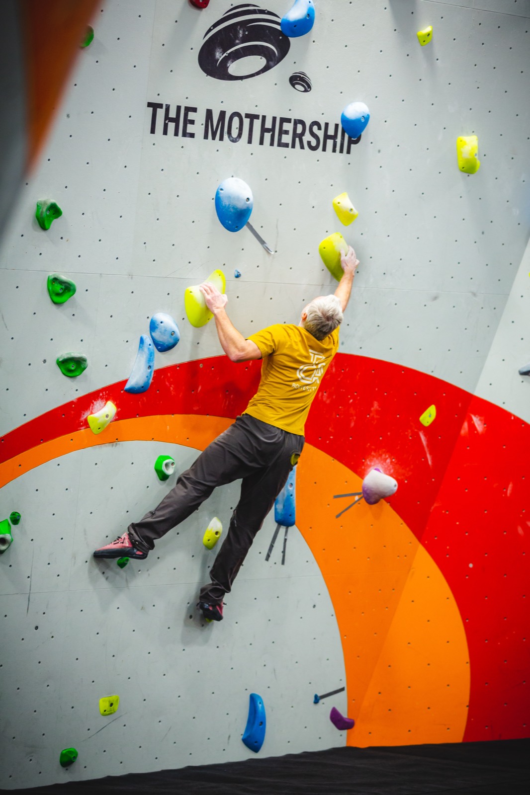 The Mothership graphic across the climbing wall