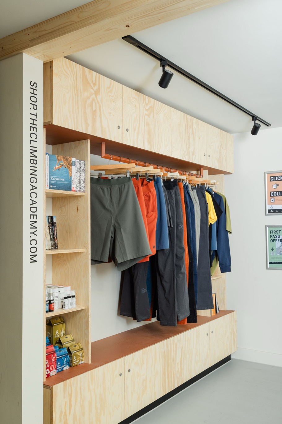 The kit shop rail on the plywood wall