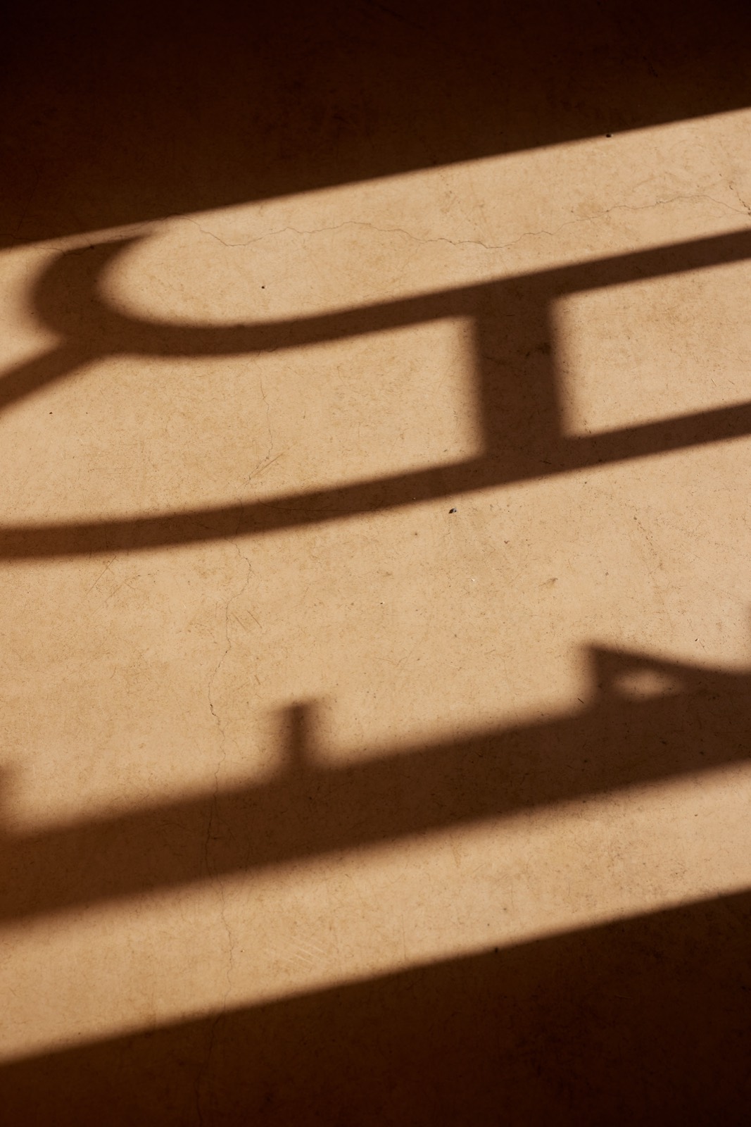 Shadows cast by the rooftop signage