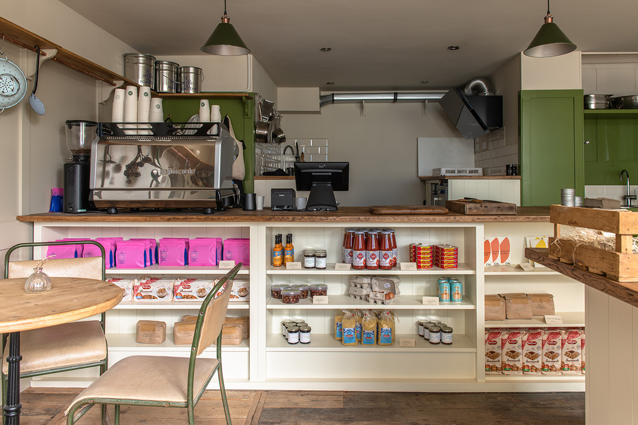 The retail interior with its fridge and produce